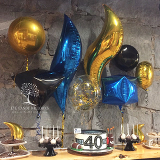 Latex-free balloon centerpieces, balloon backdrop - Eye Candy Balloons